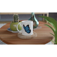 Blue Butterfly mug featuring hand-drawn butterfly artwork