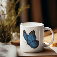 Blue Butterfly ceramic wildlife mug featuring Jay Foster’s original coloured-pencil artwork