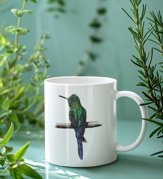 White mug with a bird design on a light green background with plants