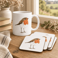 Robin mug and four matching coasters styled in a cosy countryside home