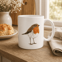 Robin mug with hand-drawn wildlife artwork in a warm countryside kitchen setting